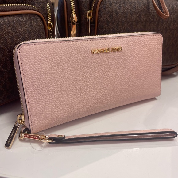 Michael Kors Handbags - MICHAEL KORS Jet Set Travel Large Pebbled Leather Continental Wristlet Wallet